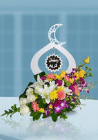 Ramadan Kareem" gift collection: Featuring dates, sweets, decorations, etc. beautifully presented.