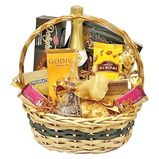 Eid Delight" Hamper: Beautifully wrapped cellophane box overflowing with treats.