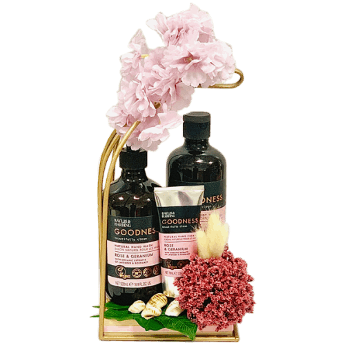 Gift set featuring Baylis & Harding Rose & Geranium body wash, hand wash, and hand cream. Beautifully wrapped in cellophane with ribbons.