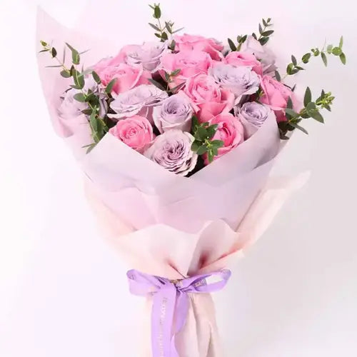 Beautifully wrapped Beauty Queen 21 Roses bouquet with ribbon bow