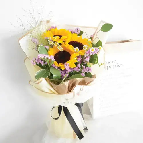 Summer Vacation – Fresh Sunflowers Bouquet with Pink Statice & Eucalyptus Leaves – Flower Delivery in Dubai, UAE | Giftshop.ae