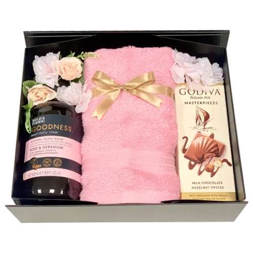 A Woman’s Favourite gift set UAE with Godiva chocolates, hand wash, and towel