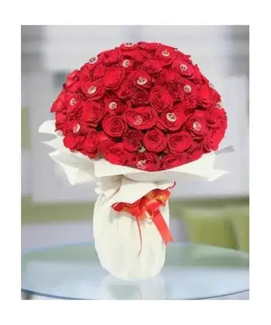 Hand-tied bouquet of 100 red roses with a personalized message card (Flowers Delivery Dubai - giftshop.ae)