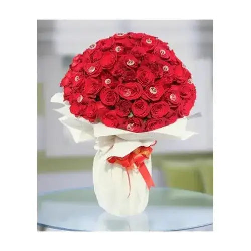 Hand-tied bouquet of 100 red roses with a personalized message card (Flowers Delivery Dubai - giftshop.ae)