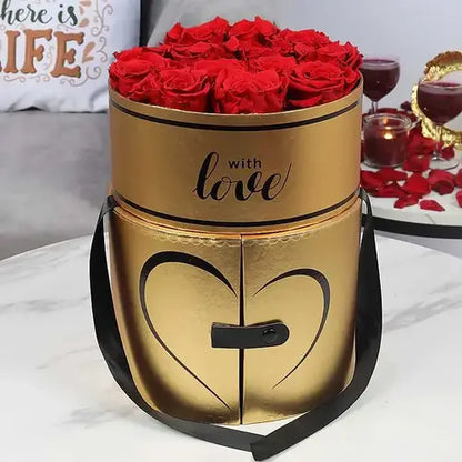 Celebrate love in style with preserved red roses in a gold box delivered fresh across the UAE