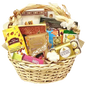 Photo of a beautiful handwoven market basket overflowing with a variety of Arabic sweets, chocolates, dates, and nuts, perfect for a gift