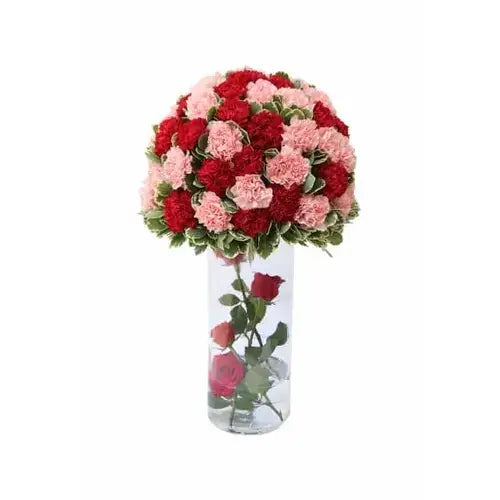 Red rose and carnation bouquet in a vase (Romantic Flowers Dubai - giftshop.ae).