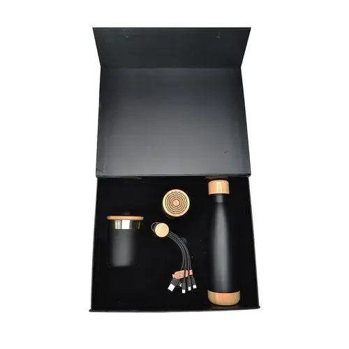 Black gift box containing a bamboo water bottle, mug, multi-cable, and bluetooth speaker (Sustainable Sips & Sounds: Bamboo Style Gift Set Dubai - Giftshop.ae)