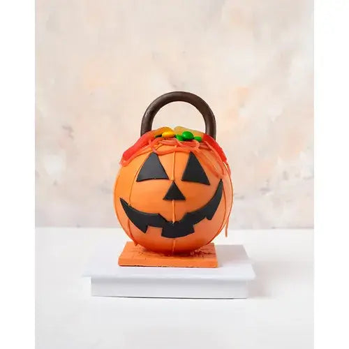  Chocolate Jack-O-Lantern basket filled with chocolate, marshmallows, gummies, and nips