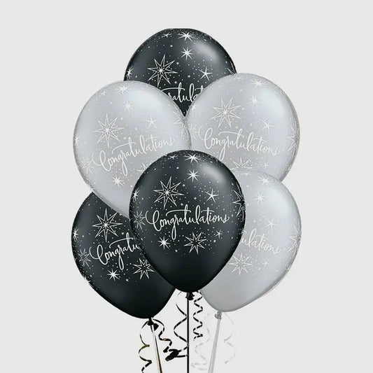  Six black and silver congratulations balloons filled with helium, ideal for party decorations.