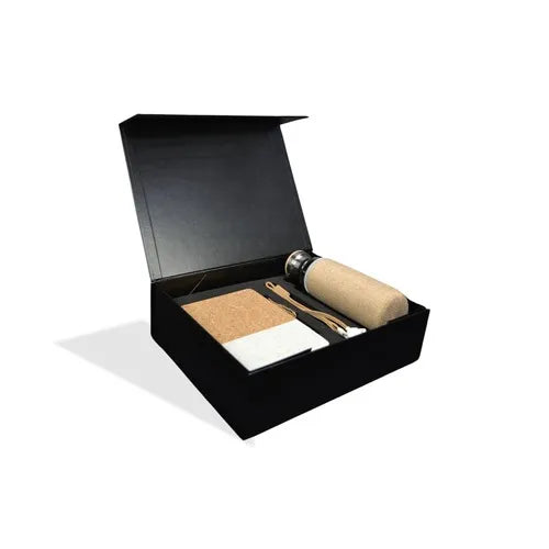 Black gift box containing a cork notebook, multi-cable, and glass bottle with bamboo lid (Sustainable Style: Eco-Friendly Gift Set Dubai - Giftshop.ae)