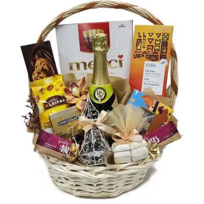 Eid Delight" Hamper: Beautifully wrapped cellophane box overflowing with treats.