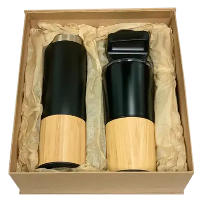 Black cardboard gift box containing black stainless steel tumbler and flask.