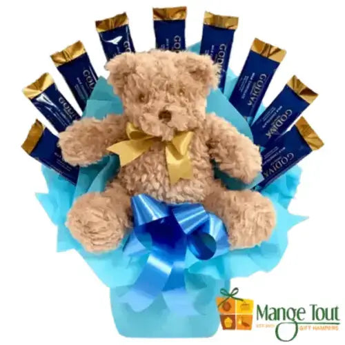 Godiva chocolate bouquet with 9 milk chocolate bars wrapped in a soft brown teddy bear.