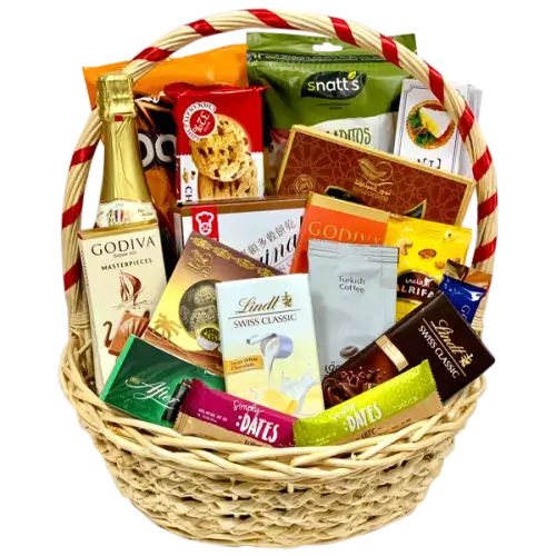  a beautifully presented Ultimate Gourmet Feast Hamper filled with chocolates, dates, snacks, coffee, and a sparkling beverage in a traditional wicker basket