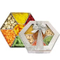 A photo of a stylish hexagonal gift box overflowing with a colorful assortment of dried fruits and premium nuts.