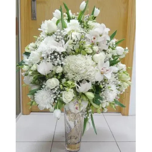 Modern flower arrangement in a glass vase (Modern Flower Delivery Dubai - giftshop.ae).