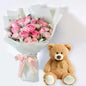 Pink flowers with teddy bear gift combo in Dubai, UAE