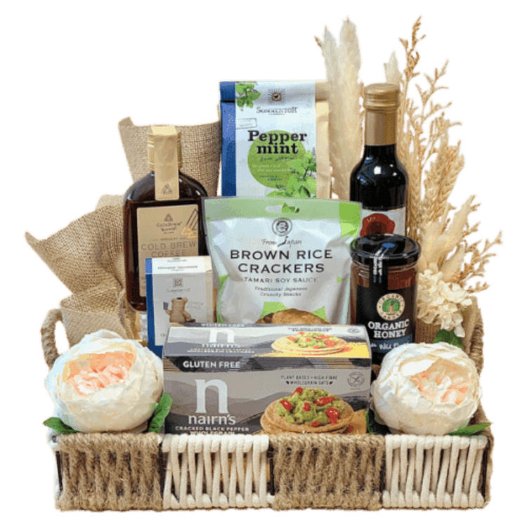 Organic Ramadan Gift Basket in a decorative basket with dried flowers