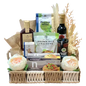 a beautifully wrapped cellophane basket filled with a variety of organic gourmet treats, teas, and healthy snacks, perfect for a Ramadan gift