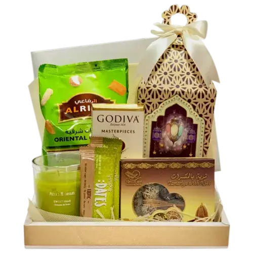 Celebrate Ramadan Delights" Gift Box: Cellophane-wrapped box with a decorative Ramadan lantern on top, overflowing with dates, chocolates, snacks, and a scented candle.