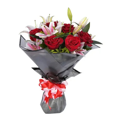 Send a bouquet of love! Red roses and pink lilies arranged for any occasion in UAE.