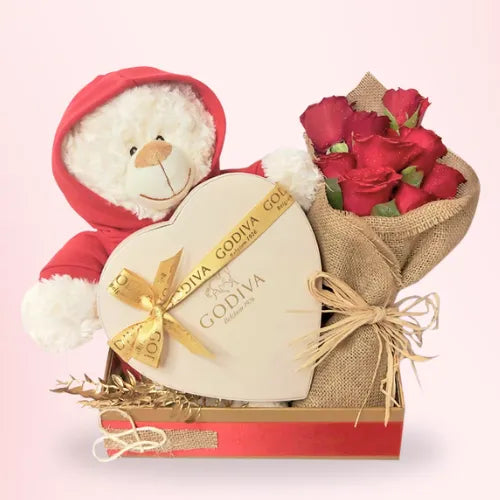 Godiva chocolates, red roses, and teddy bear - romantic gifts for wife in Dubai, UAE