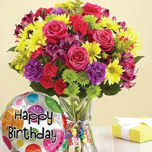 Celebrate a birthday with a bang! Colorful flowers, balloon & vase, delivered fresh across UAE.