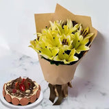 Gift basket with yellow lilies & marble cake. Thank you gift with flower & cake delivery UAE.
