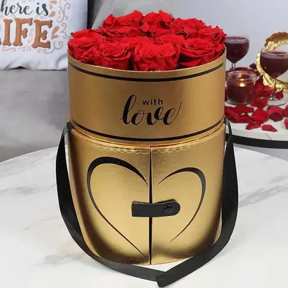 Luxurious arrangement of 13 red forever roses in a premium designer golden box, available in Dubai, UAE, from Giftshop.ae.