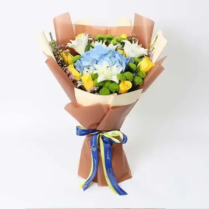 Mixed flower bouquet in brown and peach wrapping Dubai