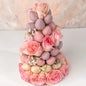 Chocolate Strawberries and Roses Tower with 35-40 chocolate-covered strawberries and pink roses available for delivery in Dubai