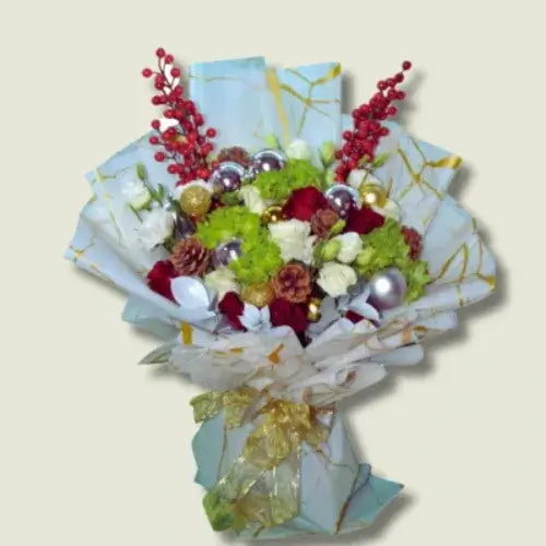 Elegant Christmas gift ideas Dubai with festive bouquet