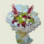 Elegant Christmas gift ideas Dubai with festive bouquet