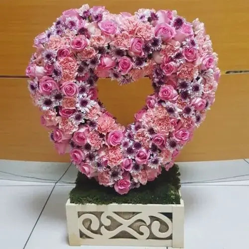 Romantic heart flower arrangement - same-day delivery from a flower shop near me in UAE