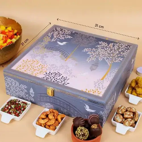 Festive gift box with chocolates and nuts