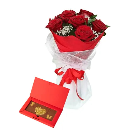 Love Combo with 7 red roses and chocolate bar, perfect Valentine’s gift in Dubai.