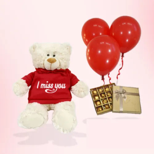 Love gift set in Dubai, UAE featuring a soft teddy bear, Belgian chocolates, and helium balloons from Giftshop.ae