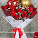 Red rose and white spray rose bouquet with love balloon and gift wrap. Dubai flower delivery (UAE).