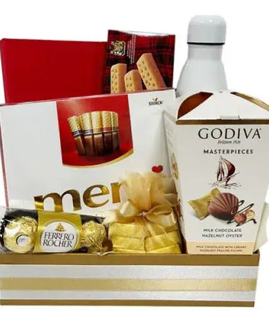 Stylish corporate gift basket with chocolates, shortbread & a reusable water bottle (UAE).