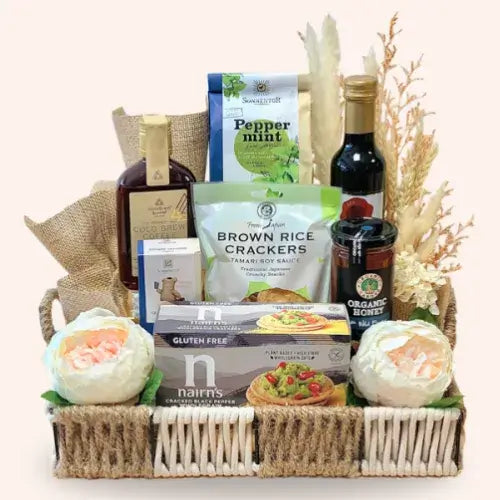 Organic gift basket featuring dried flowers, candied ginger, and balsamic vinegar in the UAE.