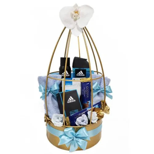 Men's spa gift basket with shower gel, deodorant, facial scrub & chocolate. Birthday gift for him UAE.