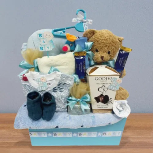 Newborn gift set in Dubai, UAE with baby essentials and chocolates