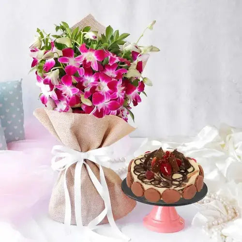 Gift basket with purple orchids, marble cake & natural jute wrap. Dubai flower & cake delivery (UAE).