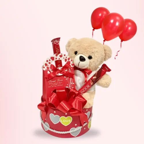 Order Lindt Valentine Gift Box online in Dubai - Includes soft teddy, chocolates, and red balloons