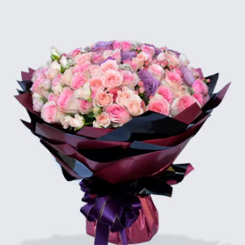 Pastel flower bouquet featuring pink and lavender roses, perfect for gifting in Dubai, UAE, available at Giftshop.ae