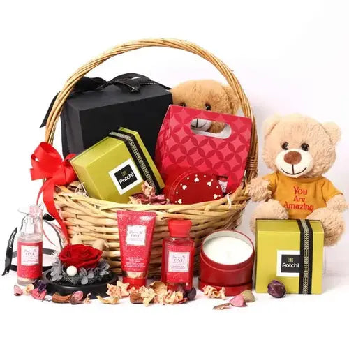 Infinity Love Gift Basket with Patchi Chocolates, rose, teddy bear, and bath products.