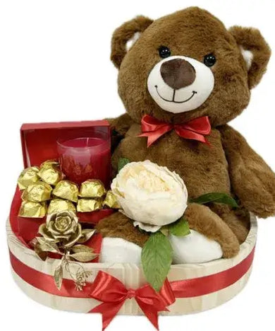Celebrate your love with a cuddly teddy bear, chocolates & keepsake tray (UAE).