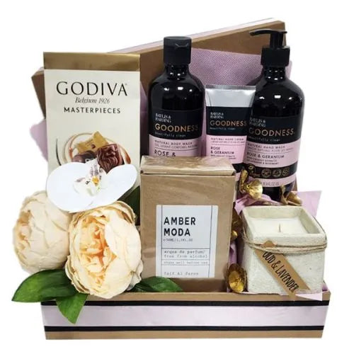 Luxury rose-scented gift hamper with bath essentials, perfume & chocolates. Dubai delivery.