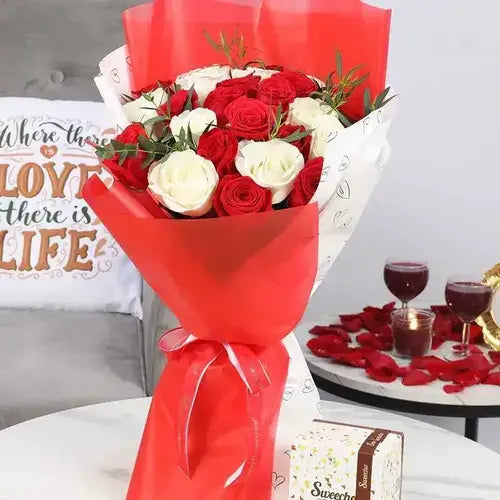 11 Red Roses and 10 White Roses Bouquet with Sweecho Chocolates UAE